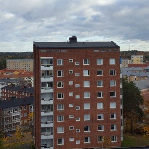 Tegelbyggnad för lägenheter